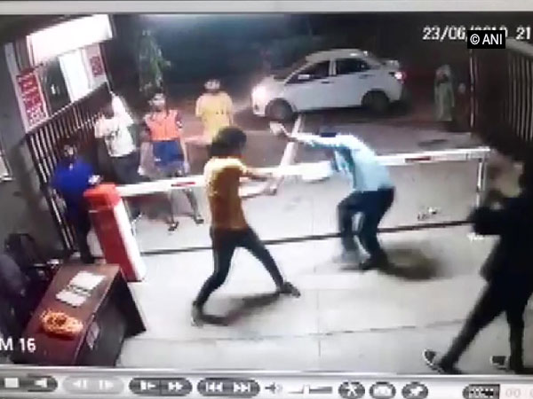 Assailant attacking security guards