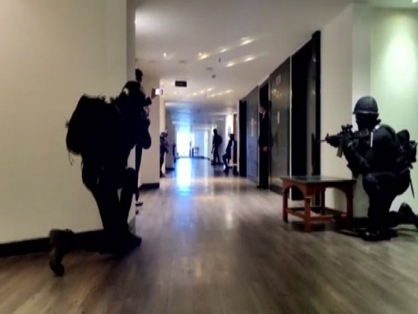 NSG commandos comnduct a security mock drill in an Indore hotel on Friday. [Photo/ANI]