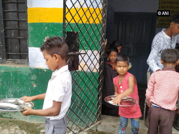 Children of the school waiting to get the mid-day meal in Lucknow in Uttar Pradesh. Photo/ANI