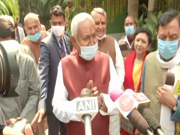 Bihar Chief Minister Nitish Kumar speaks with reporters after performing Saraswati Puja in Patna on Tuesday. [Photo/ANI]