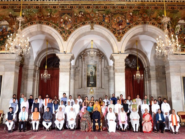 President Ram Nath Kovind with the Council of Ministers (File photo/ANI)