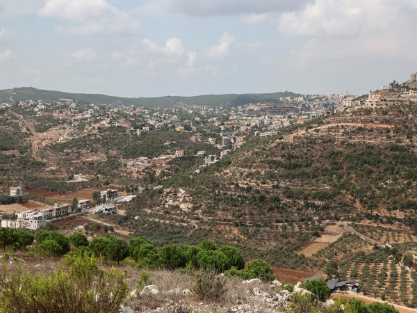 A view shows Ayta al-Shaab village as pictured from Rmeish near Lebanese-Israeli border (Image Credit: Reuters)