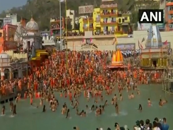 Sadhus of Juna Akhara participate in first 'Shahi Snan' of Kumbh Mela 2021