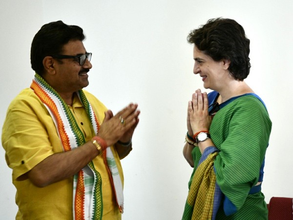 Ravi Dutt Mishra with Congress general secretary Priyanka Gandhi on Thursday. Photo/ANI
