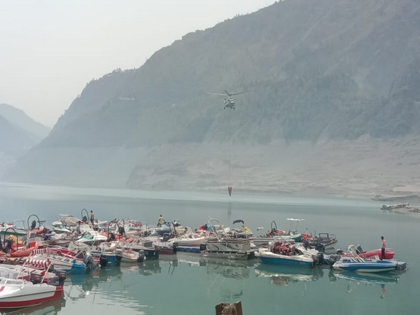 Water being fatched by a helicopter in Uttarakhand. (Photo/ANI) 