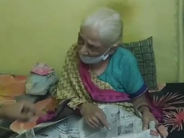 Chanda Bai sitting at her home after being recovering from coronavirus. Photo/ANI