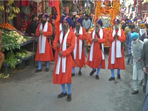 The District Gurudwara Prabandhak Committee organised 'Nagar Kirtan' on Guru Gobind Singh Jayanti in Poonch. [Photo/ANI]