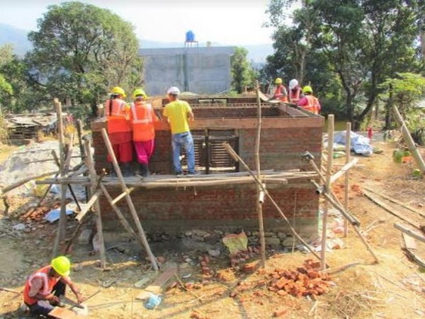 Workers trained under UNDP program at work to construct Earthquake resilient houses in Gorkha district of Nepal