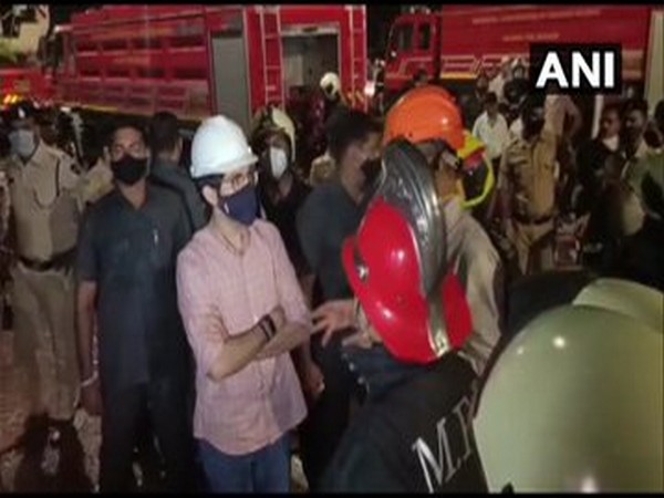 Aaditya Thackeray along with other officials was seen conversing with the fire department personnel at Nagpada. Photo/ANI