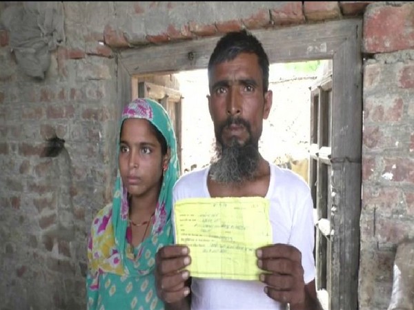One of the affected woman with her father. Photo/ANI