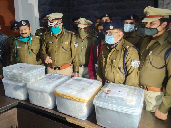 Indore Police officials with the seized MDMA drugs consignment [Photo/ANI]