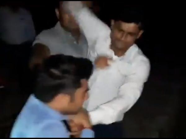 A still from the video of the assault on journalist which is going viral on social media. 