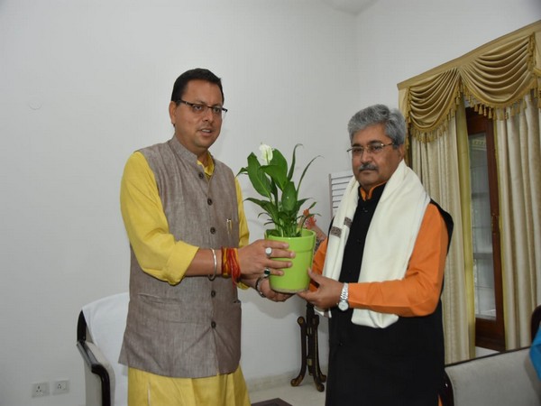Uttarakhand CM Pushkar Singh Dhami with BJP's state in-charge Dushyant Kumar Gautam. (Photos/ANI)