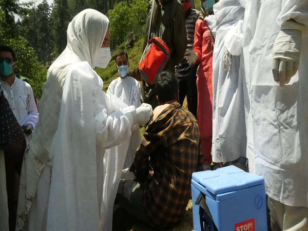 Team of doctors vaccinating people at Weyan 