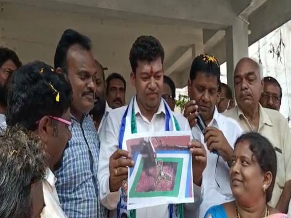 Minister Seediri Appalaraju presenting  the 