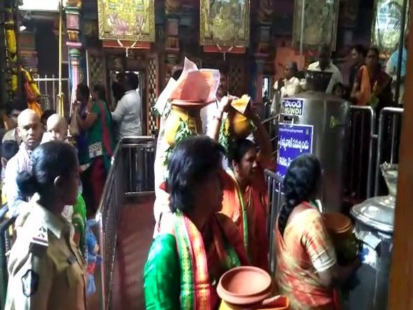 Women praying at Kanaka Durga Temple on Friday. Photo/ANI