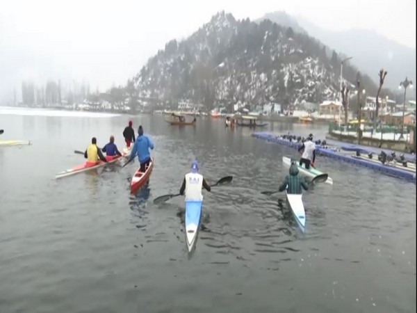 Players practicing in the Dal lake in Srinagar ahead of the national championship scheduled to be held in Bhopal this month. [Photo/ANI]