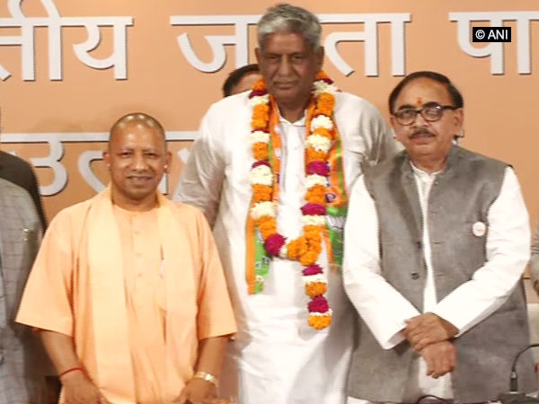 Uttar Pradesh Chief Minister Yogi Adityanath, Choudhary Virender Singh and state unit BJP president Mahendranath Pandey in Lukcnow on Saturday. Photo/ANI