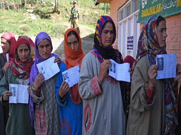 Women in queue to cast their votes at a polling stations in Anantnag, Jammu and Kashmir, on Monday. Photo/ANI