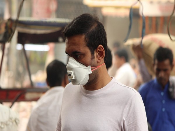 A man walks wearing a face mask due to heavy smog in New Delhi [File Image]