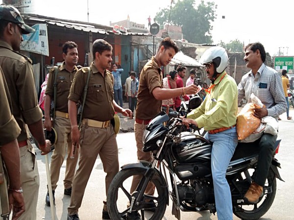 A policeman conducts checks as Section 144 imposed in Ayodhya. Photo/ANI