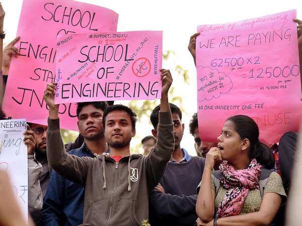 JNU students holding placards during a press conference at JNU Campus in New Delhi on Tuesday.