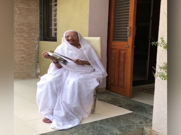 Mother of Prime Minister Narendra Modi, Heeraben clangs utensil at her residence.