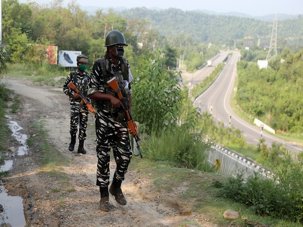 CRPF personnel patrol along the Jammu-Srinagar National Highway ahead of Amarnath Yatra