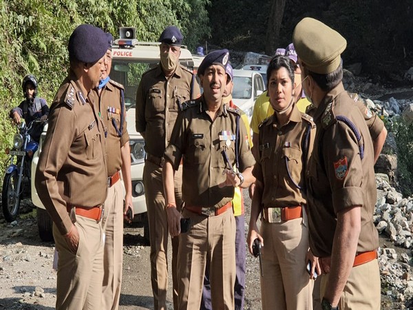 Uttarakhand Director General of Police (DGP) Ashok Kumar along with police personnel (file photo)