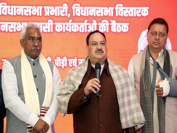 BJP National President JP Nadda, Uttarakhand CM Pushkar Singh Dhami and State party president Madan Kaushik. (Photo/ANI)