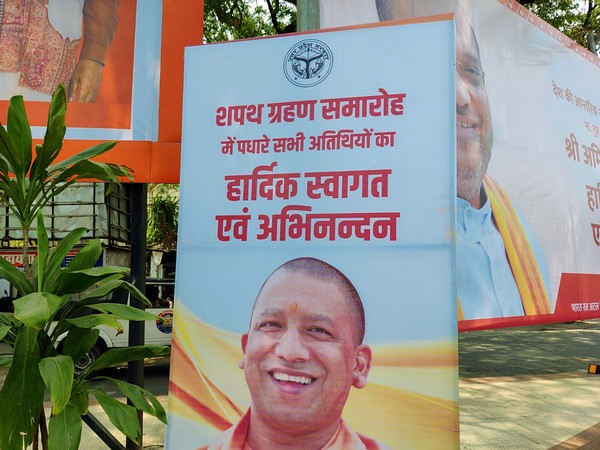 Hoarding welcoming visitors to swearing-in ceremony of Yogi Adityanath as UP CM (Photo:ANI)