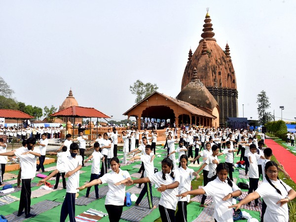Students perform Yoga in Assam (File photo/ANI)
