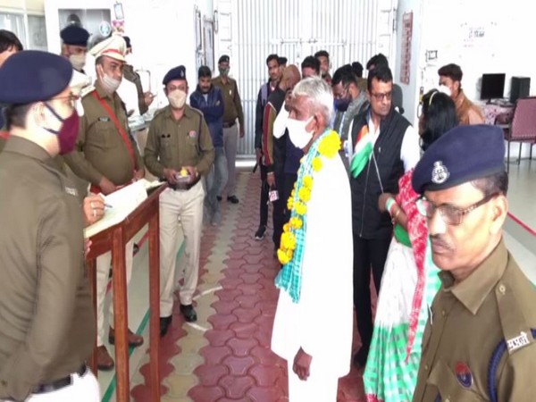 Police felicitating a prisoner for his good conduct. (Photo/ANI)