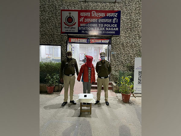 Tilak Nagar police with an accused in sexual assault case. (Photo/ANI)