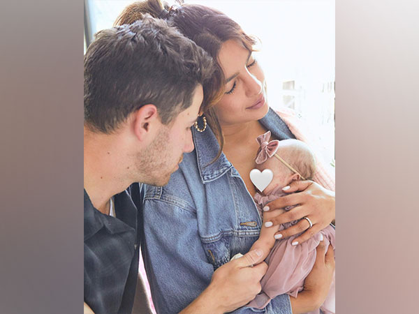 Priyanka Chopra, Nick Jonas and their daughter (Image source: Instagram)