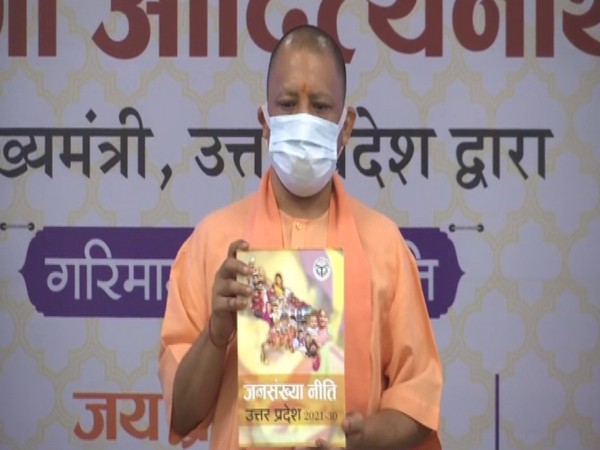 Uttar Pradesh Chief Minister Yogi Adityanath unveils the new population policy, in Lucknow on Sunday. [Photo/ANI]