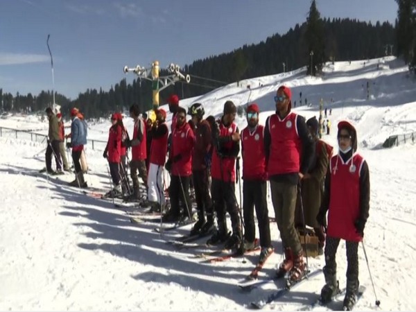 Young tourists learning skiing in Jammu and Kashmir's Gulmarg.