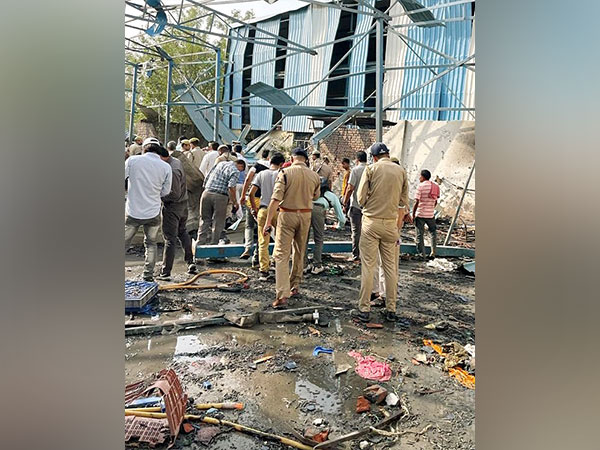 Police personnel investigate explosion site at Hapur (Photo/ANI)