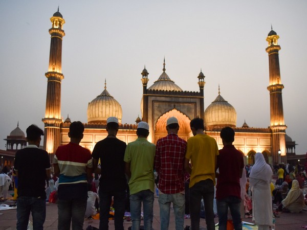 Devotees offer namaz on the eve of Eid-ul-fitr at Jama Masjid, in Delhi on Monday. (ANI Photo)