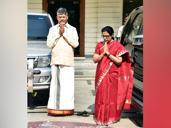 Andhra Pradesh Chief Minister N Chandra Babu Naidu, left, with his wife Nara Bhuvaneshwari offering prayers at their residence in Amaravati on Saturday. Photo/ANI