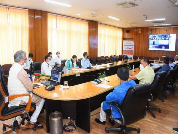 CM Rawat at a virtual meeting