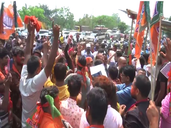 BJP workers celebrate in Guwahati as the party sweeps the Guwahati Municipal Corporation polls. (Photo/ANI)