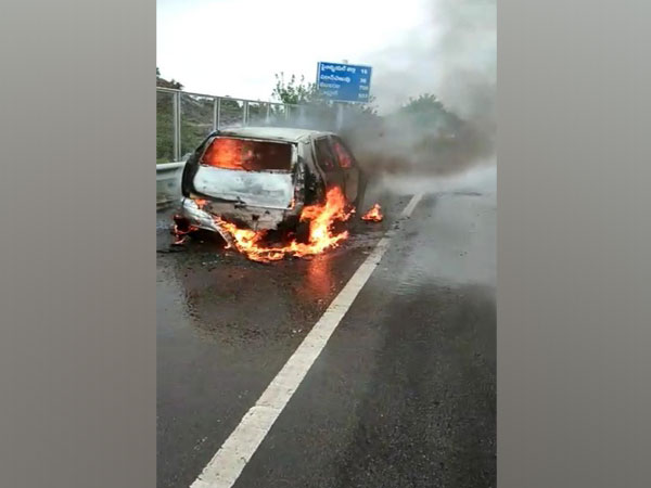Moving car gutted by fire in Telangana on Thursday. (Photo/ANI)