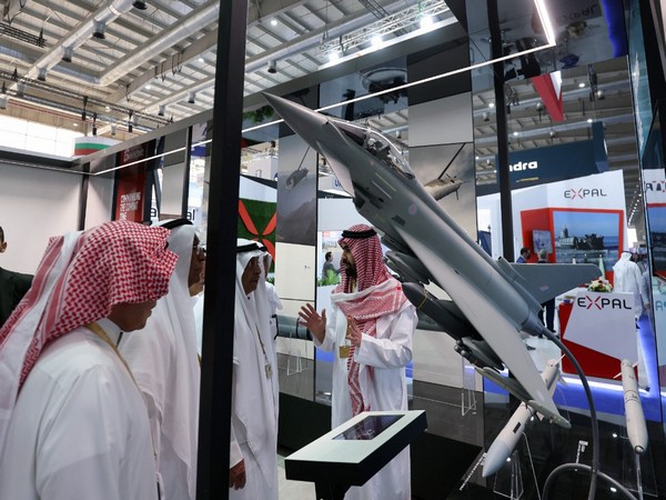 Men talk at World Defense Show, in Riyadh. (Photo credit: Reuters)