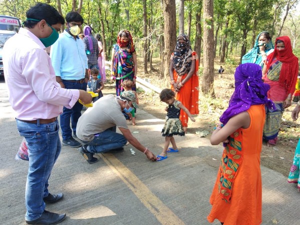 Slippers being distributed to migrant labourers in Chhattisgarh (Photo/ANI)