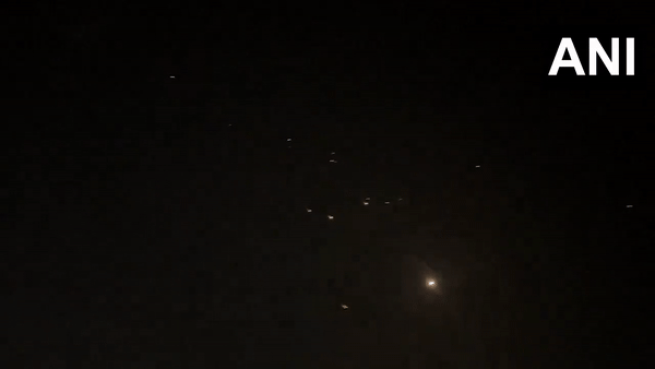 Objects are seen in the sky above Jerusalem after Iran launched drones and missiles towards Israel, in Jerusalem (File Photo/Reuters)