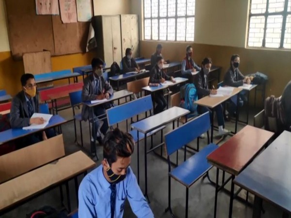 Students attend classes at a Moradabad school after schools in Uttar Pradesh reopened for classes 6 to 8 on Wednesday. [Photo/ANI]
