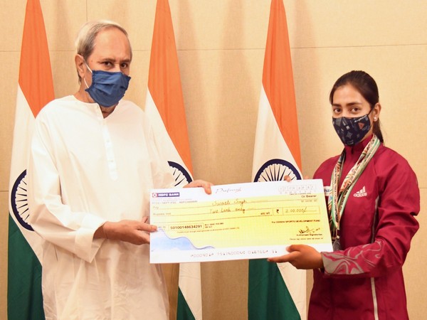 Odisha CM Naveen Patnaik (left) felicitates cyclist Swasti Singh (Photo/ANI) 