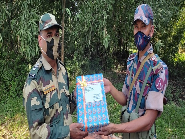 BSF personnel exchange sweets with Border Guard, Bangladesh on occasion of Diwali (Photo/ANI)