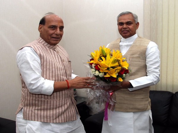 Union Defence Minister Rajnath Singh [L] with Gujarat governor Acharya Dev Vrat [R] in New Delhi [Photo/ANI]
